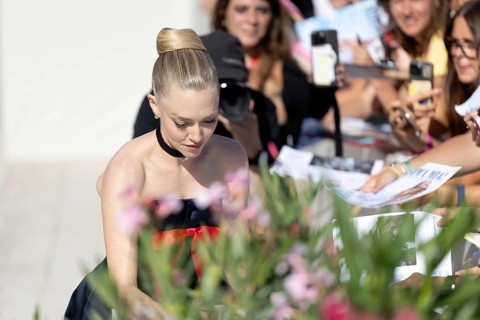Venice, Italy - 1 September 2025: Amanda Seyfried signing autographs during the Red Carpet of - The