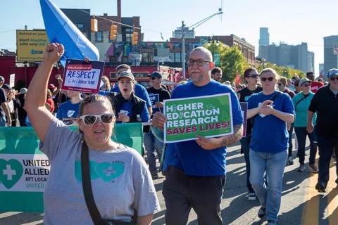 Detroit, Michigan USA - 1 September 2025 - Members of the American Federation of Teachers march in