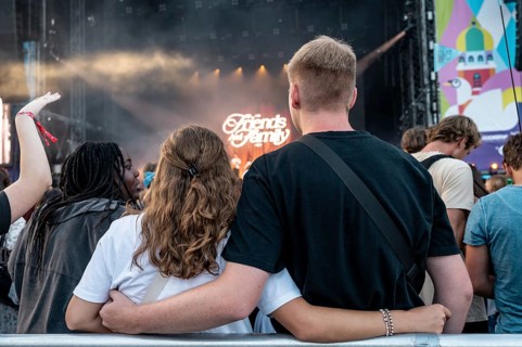 Two festival-goers hugging Shawn Mendes at the Superbloom Festival, Day 2 at the Olympiapark,