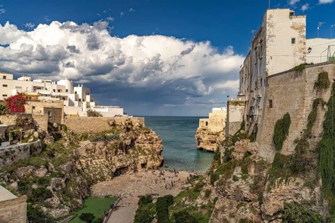 City beach Spiaggia Llama Monachile in Polignano a Mare, Apulia, Italy