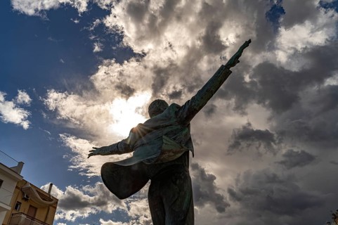 Statue of the singer Domenico Modugno, Polignano a Mare, Apulia, Italy