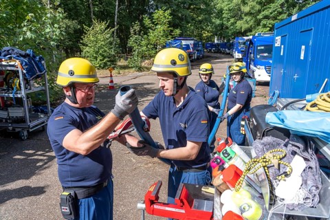 Emergency services from the infrastructure specialist group set up water, sewage, electricity and