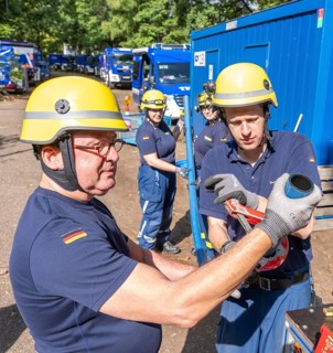 Emergency services from the infrastructure specialist group set up water, sewage, electricity and