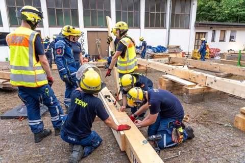 Preparation work for the construction of a facade support, a building in danger of collapsing, with