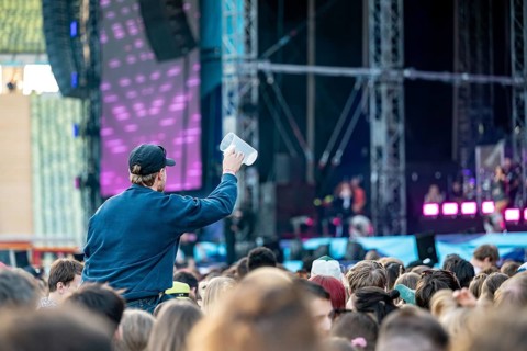 Visitors celebrate during Nelly Furtado's performance at the Superbloom Festival, Day 1 at the