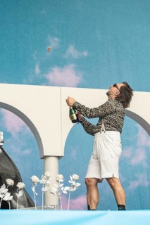 Ralph Stachulla (Keyboarder) of Roy Bianco & Die Abbrunzati Boys with champagne bottle at the