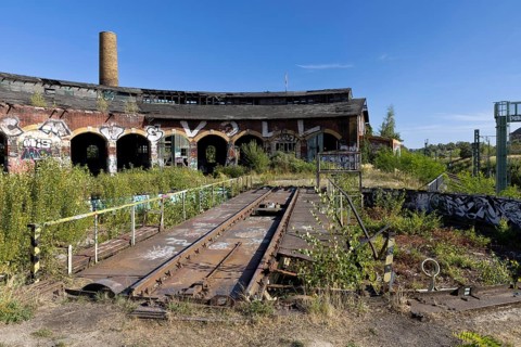 Old locomotive shed at MDR S-Bahn station, Leipzig, Saxony, Germany, 26 August 2025 < english> Old
