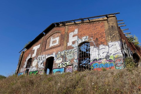 Old locomotive shed at MDR S-Bahn station, Leipzig, Saxony, Germany, 26 August 2025 < english> Old