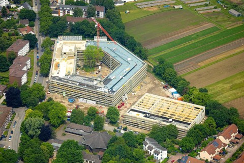 Aerial view, construction site with new building of the Anne-Frank comprehensive school on Obere