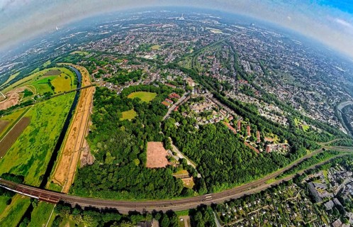 Aerial view, Ruhrpark forest area on the Ruhr river and Ruhr valley with railway bridge,