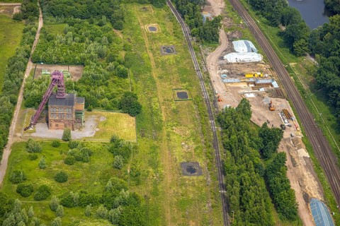 Aerial view, site with historic pithead frame of Sterkrade colliery, construction site, Schwarze