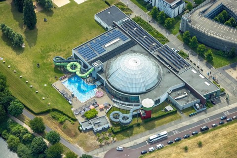 Aerial view, AQUApark Oberhausen adventure pool, outdoor pool with water slide, in Westfield Centro