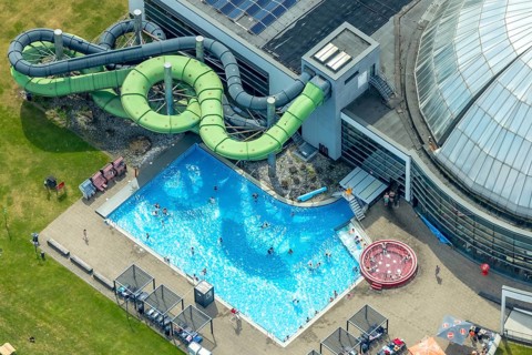 Aerial view, AQUApark Oberhausen adventure pool, outdoor pool with water slide, in Westfield Centro