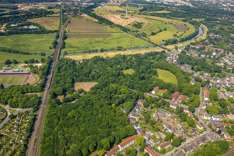 Aerial view, Ruhrpark forest area, railway bridge and river Ruhr with Ruhr bank, sports field in