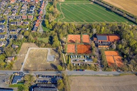 Aerial view, brownfield building plot for planned residential project Am Gorbach, tennis courts TV