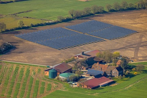 Aerial photo, solar park, open space photovoltaic plant in the Berger farming community,