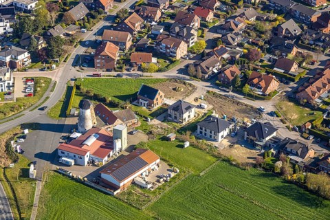 Aerial view, windmill with mill tower Bergstraße, construction site new building residential area,
