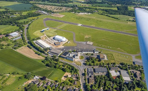 Aerial view, Essen/Mülheim Airport, Goodyear airship Zeppelin, construction site next to the WDL