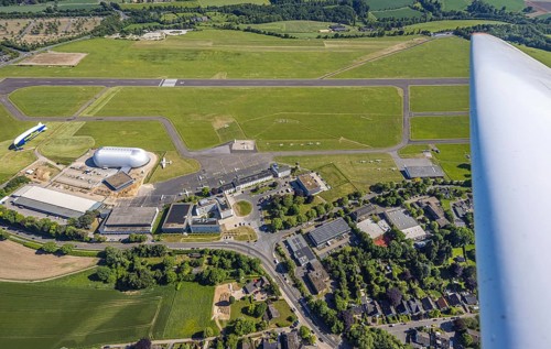 Aerial view, Essen/Mülheim Airport, Goodyear airship Zeppelin, construction site next to the WDL