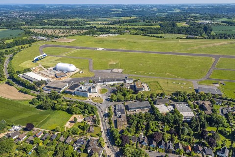 Aerial view, Essen/Mülheim Airport, Goodyear airship Zeppelin, construction site next to the WDL