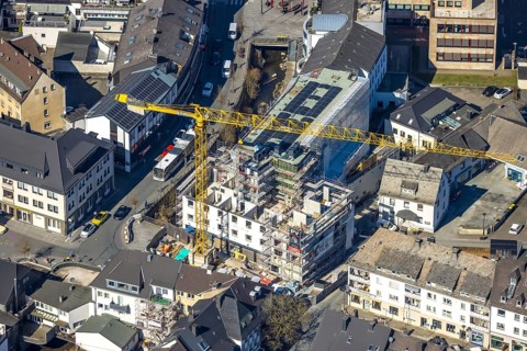 Aerial view, construction site with construction crane at Winziger Platz corner Zeughausstraße and