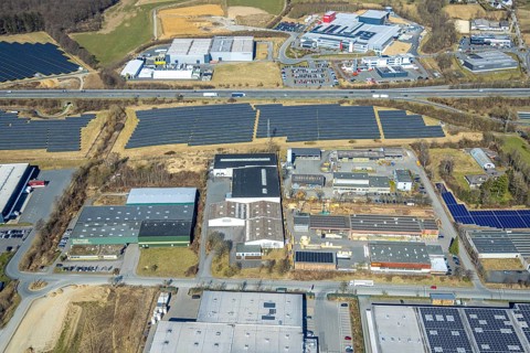 Aerial view, commercial area Enste with citizen solar park at the motorway A46, Enste, Meschede,