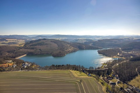 Aerial view, Hennesee Hennetalsperre with dam wall, forest area and hilly landscape, Berghausen,