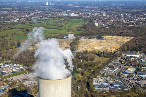 Aerial view, Trianel Kohlekraftwerk Lünen GmbH with smoking cooling tower, behind brownfield former