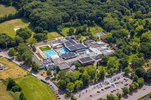 Aerial view, LAGO Die Therme, swimming pool and wellness centre with water slide, roof with solar