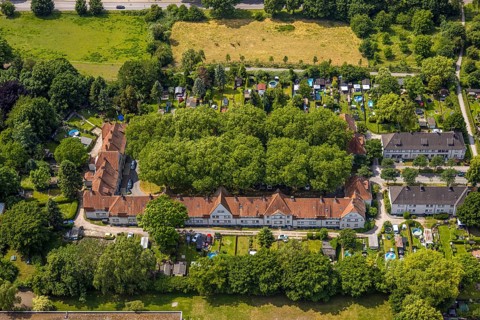 Aerial view, housing estate settlement Teutoburgia miners' settlement with group of trees in the