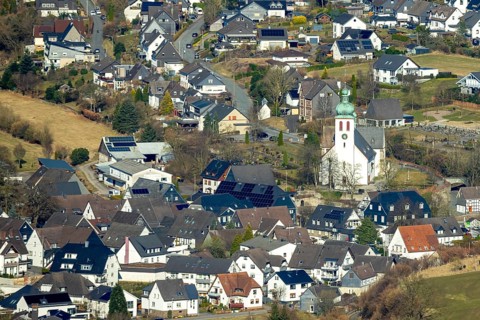 Aerial view, residential area and village view with catholic church St. Jakobus der Ältere in