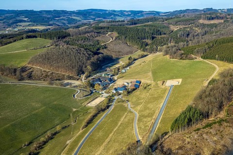 Aerial view, Icelandic horse stud Falkenegg, Richard Hufnagel, forest and hilly landscape,