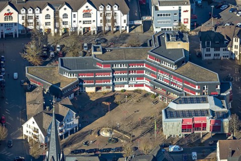 Aerial view, Lennestadt town hall and Thomas-Morus-Platz, spire of St. Agatha church, Altenhundem,