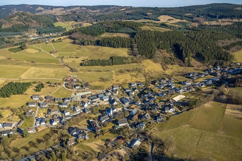 Aerial view, residential area, view of Marmecke with St. Antonius Church, wooded area, hilly