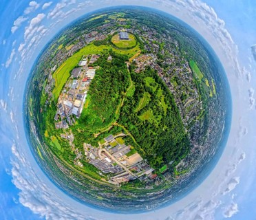 City forest Im Uhlenbruch, residential area Sodingen with academy Mont-Cenis and tree avenue