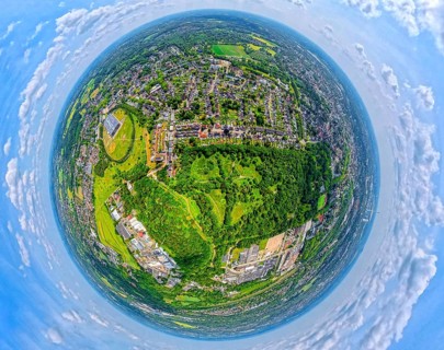 City forest Im Uhlenbruch, residential area Sodingen with academy Mont-Cenis and tree avenue