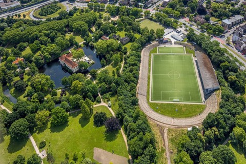 Aerial view, Strünkede Castle moated castle with moat and castle park and Edeka Koch sports park