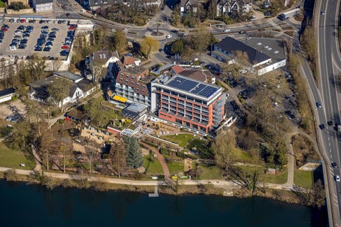 Aerial view, Hotel Zweibrücker Hof with solar roof and beer garden, Action Supermarket, roundabout