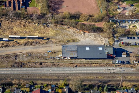 Aerial photo, AREA52 GmbH Hagen on the railway line around the Haspe district sports facility,