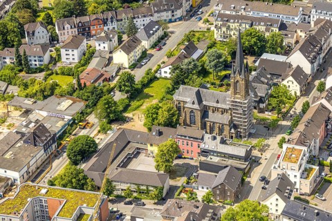 Aerial view, construction site catholic church St. Suitbertus with scaffolding on the church tower,