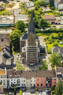Aerial view, construction site catholic church St. Suitbertus with scaffolding on the church tower,