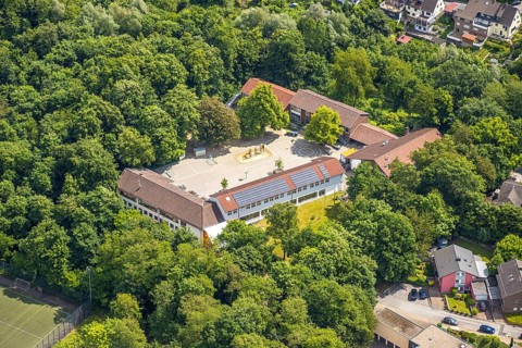 Aerial view, St. Suitbertus Municipal Catholic Primary School with schoolyard, roof with solar