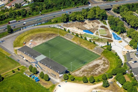 Aerial view, Glückauf Kampfbahn football stadium at Ernst-Kuzorra-Platz with construction site and