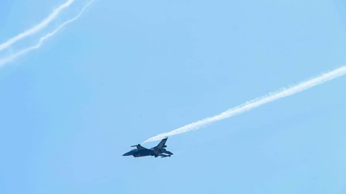 Turkish Air Force helicopters and fighter jets perform aerobatic maneuvers during Teknofest