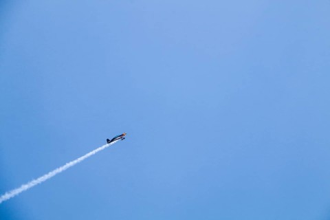 Turkish Air Force helicopters and fighter jets perform aerobatic maneuvers during Teknofest