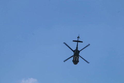 Turkish Air Force helicopters and fighter jets perform aerobatic maneuvers during Teknofest