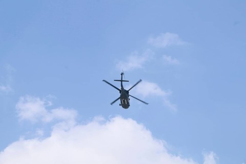 Turkish Air Force helicopters and fighter jets perform aerobatic maneuvers during Teknofest