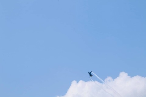 Turkish Air Force helicopters and fighter jets perform aerobatic maneuvers during Teknofest