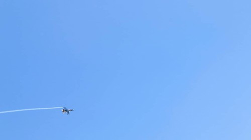 Turkish Air Force helicopters and fighter jets perform aerobatic maneuvers during Teknofest