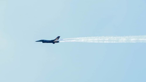Turkish Air Force helicopters and fighter jets perform aerobatic maneuvers during Teknofest